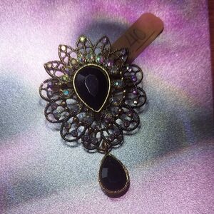 Elegant Black and Gold Brooch